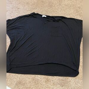 Size large but fits very oversized,  black V-neck shirt